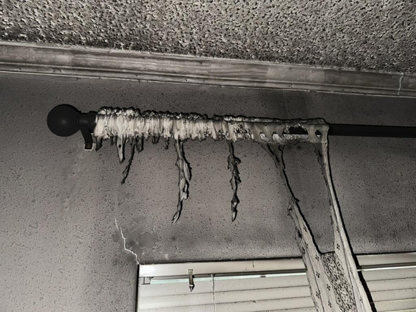 Burnt window and curtain rod