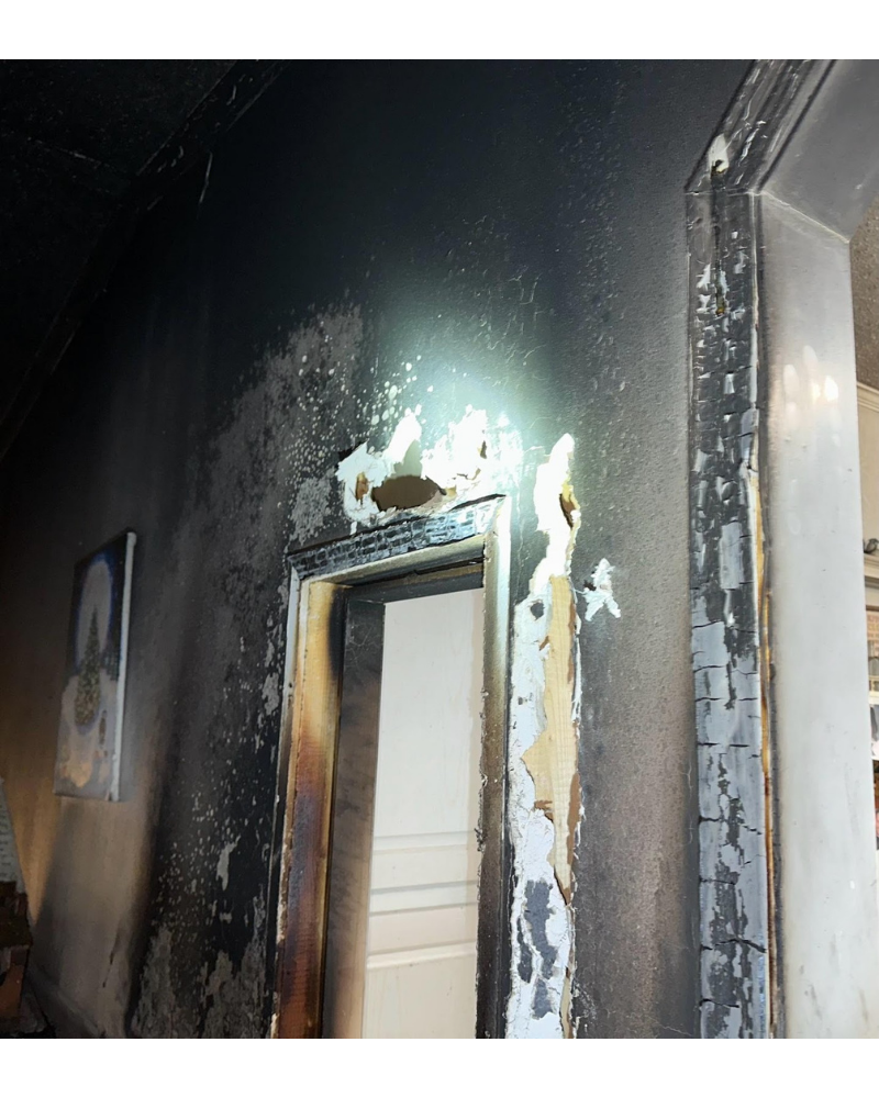 Wall showing clear signs of fire damage