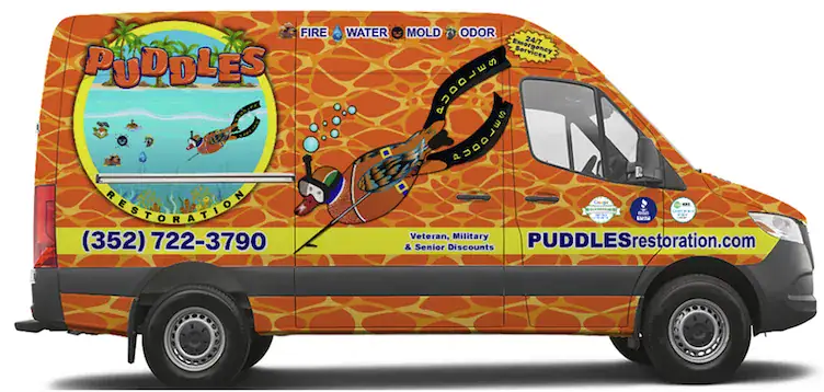 Van with colorful graphics depicting water and restoration themes.